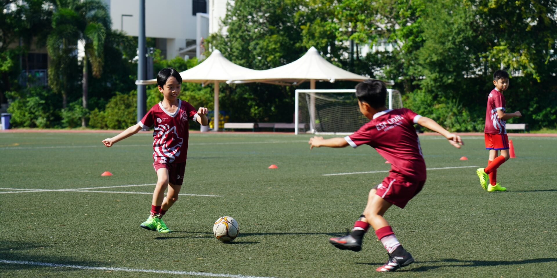 ESF Lions playing football at our school football facilities greenfield